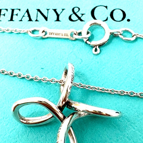 - AuthenticTiffany & CO. Elsa Peretti Infinity Cross Pendant Necklace. - Picture 6 of 11